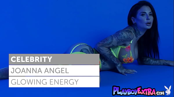 Petite busty MILF Joanna Angel slips out of her colorful neon lingerie